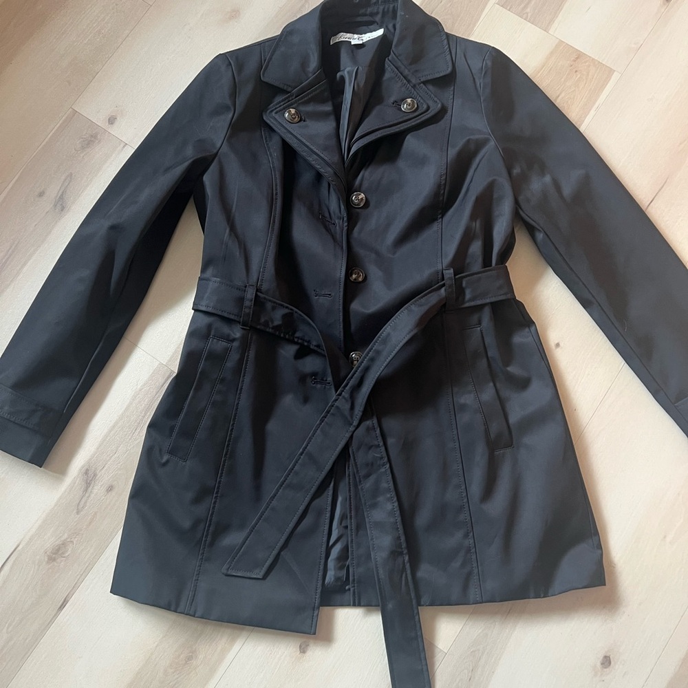 Kenneth Cole Black Trench Coat with Belted Waist. Front pockets, fully lined.